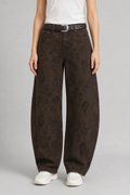 Front view of QAYQEY brown paisley-jacquard curved-leg jeans, waist-down crop on model
