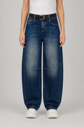 Front view of QAYQEY deep-blue knee-dart curved-leg jeans, waist-down crop on model