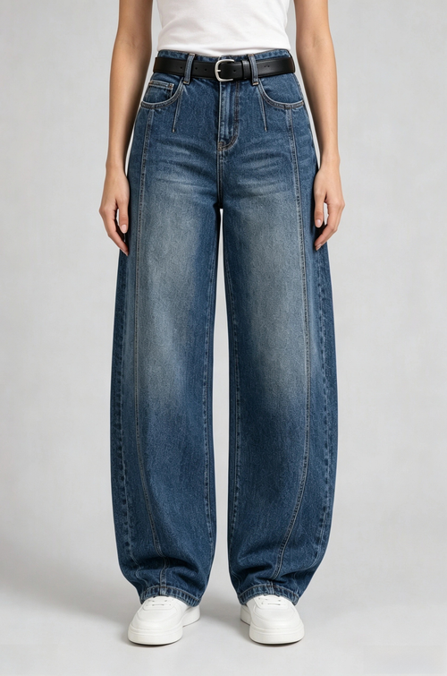 Front view of QAYQEY vintage-blue curved-leg jeans, waist-down crop on model