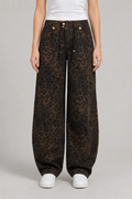 Front view of QAYQEY brown leopard-print curved-leg jeans, waist-down crop on model