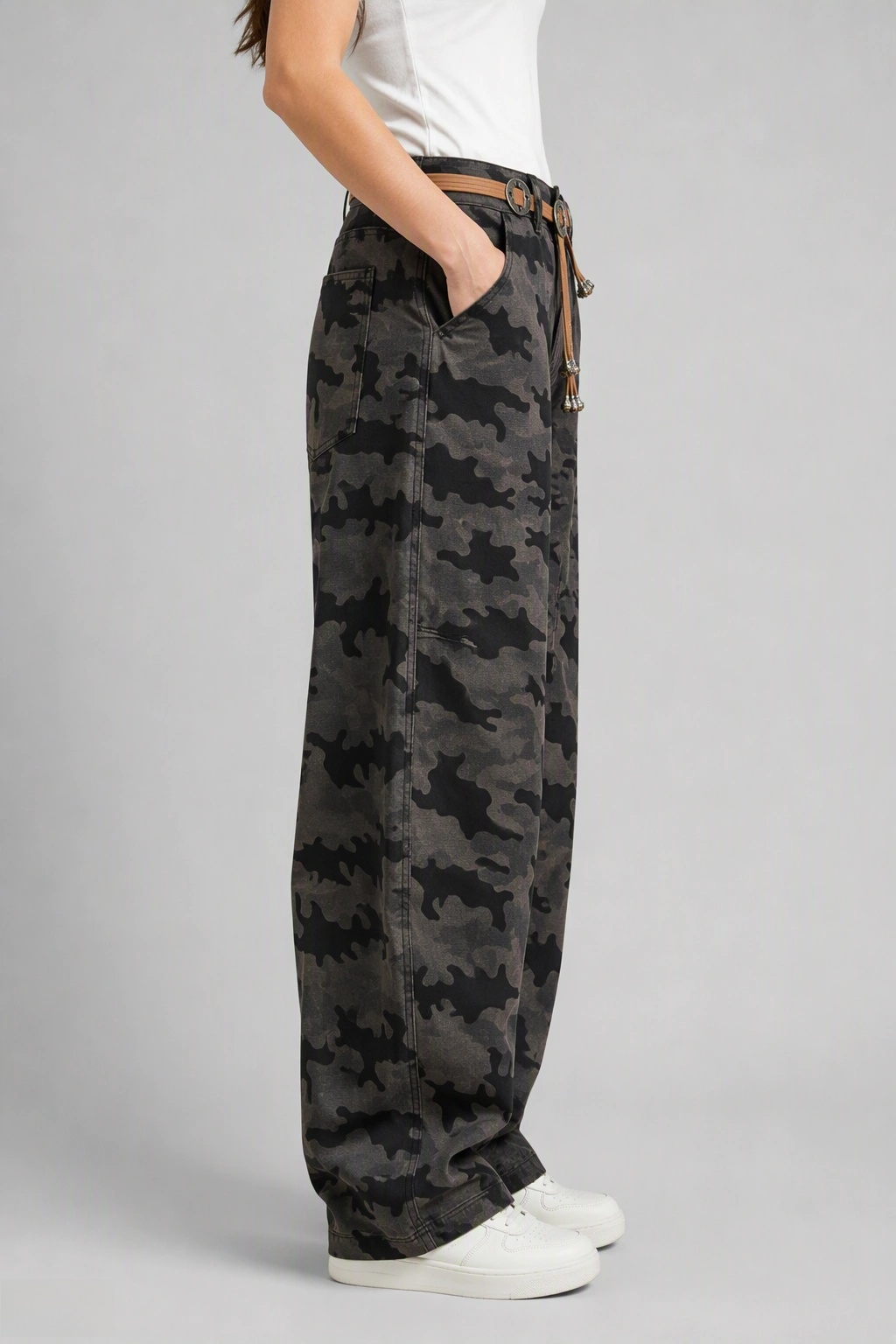Side view of QAYQEY gray-black camouflage curved-leg jeans, showing the curved outseam